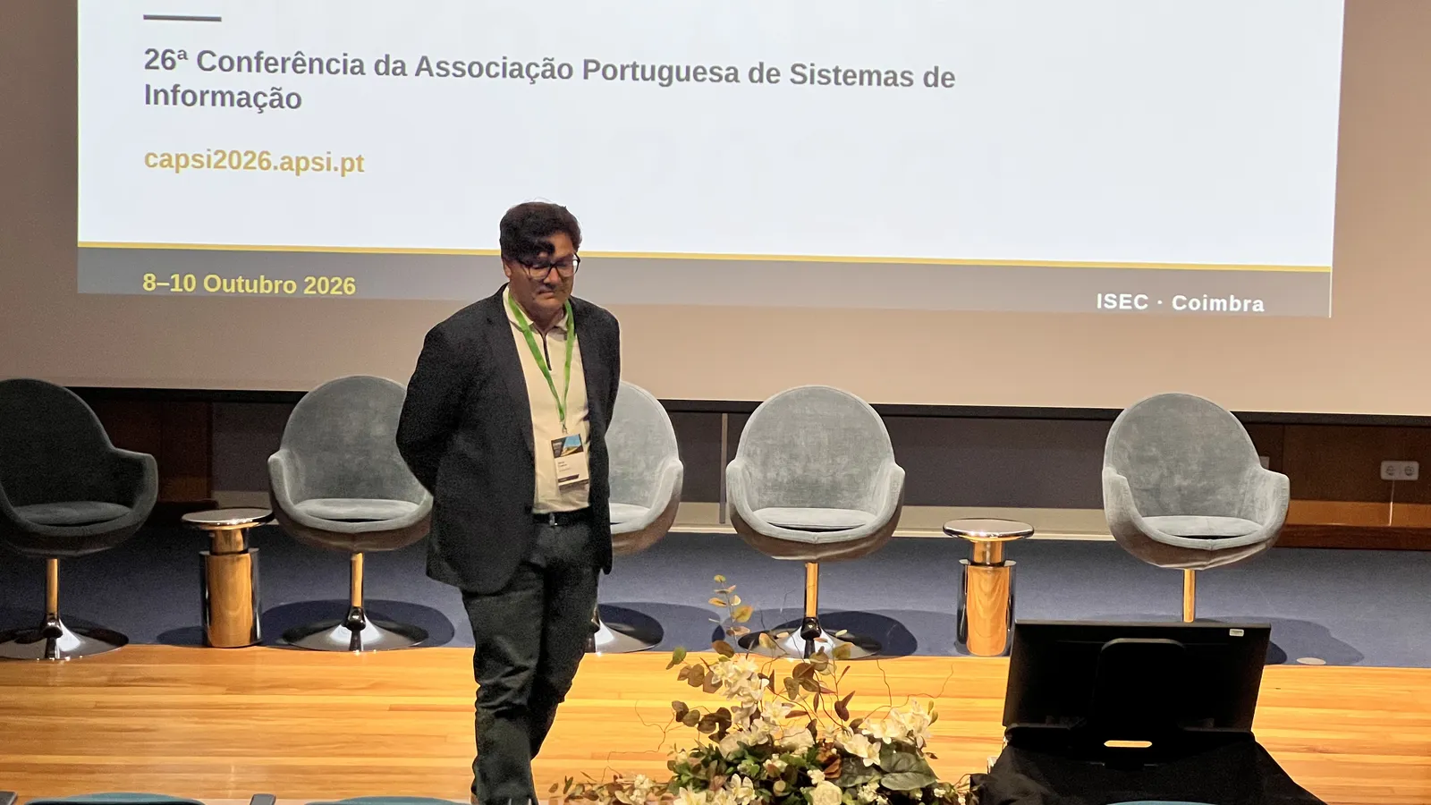 A speaker at a conference on information systems